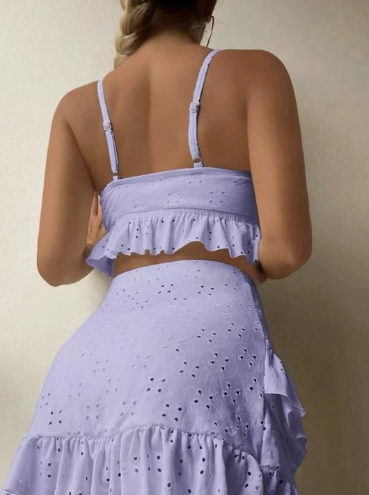 Light blue eyelet two-piece swimsuit set with a tie-front crop top and a matching ruffle-trim hip-hugging skirt. - Image 25