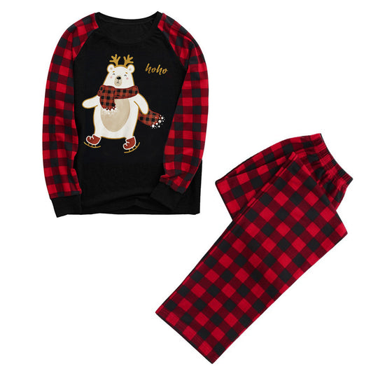 Kids' Christmas pajamas with a black long-sleeve top featuring a cartoon bear in a plaid scarf and ice skates, paired with red and black plaid pants. - Image 3