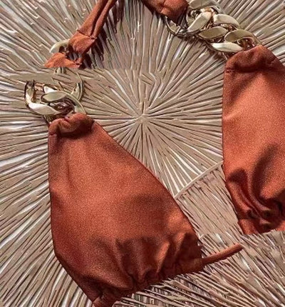 Dark brown bandeau bikini with a gold ring detail on the top and matching side-tie bottoms with gold rings. - Image 7