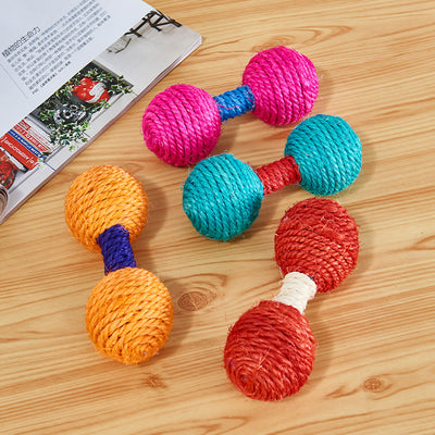 Five colorful sisal dumbbell-shaped cat toys in blue, pink, teal, orange, and red on a light wood surface.