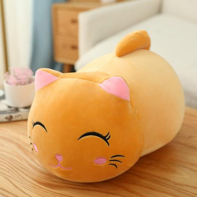 Cute orange cat plush doll with pink ears, black eyes, and embroidered whiskers, resting on a white book. - Image 27