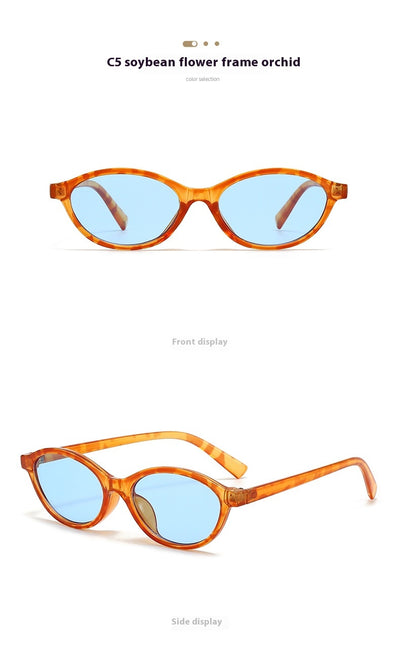 Retro fashion small frame sunglasses with translucent brown frames and yellow oval lenses, viewed from an angle. - Image 13