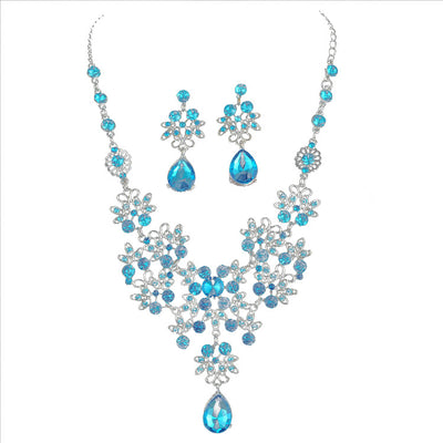 Silver-tone necklace and matching drop earrings set with clear rhinestones and teardrop crystals, ideal for weddings. - Image 12