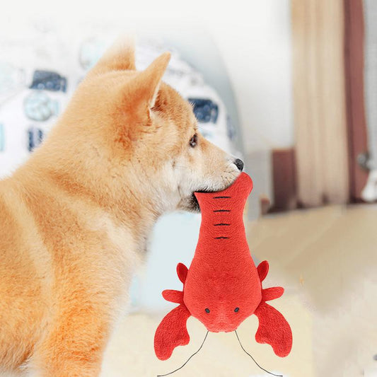 Purple plush eggplant pet toy with a green stem and an embroidered happy face, designed for dogs and cats. - Image 2