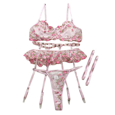 Pink floral embroidered lace lingerie set with bra, garter belt, and thong on a white textured background. - Image 16