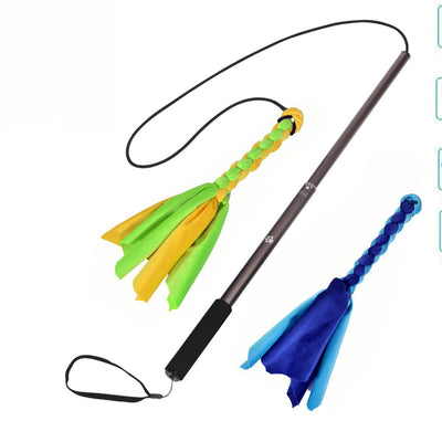 Black telescopic pet training rod with a black cord and two interchangeable braided fabric attachments in green/yellow and blue. - Image 7