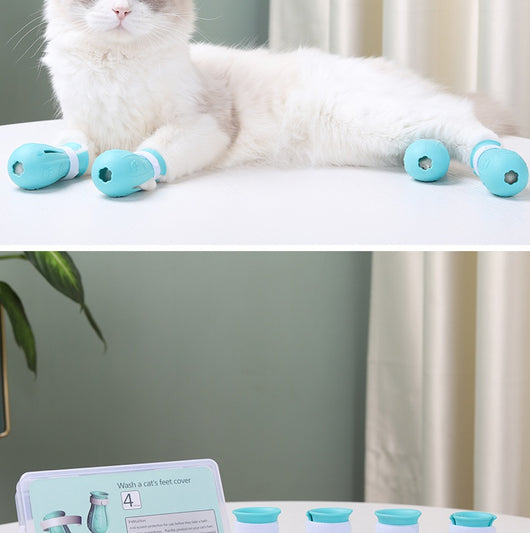 Four teal rubber cat paw covers with white hook-and-loop straps and paw print details, designed for anti-scratch protection. - Image 20