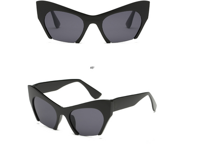 Red cat-eye sunglasses with silver mirrored lenses, featuring a bold retro frame design. - Image 4