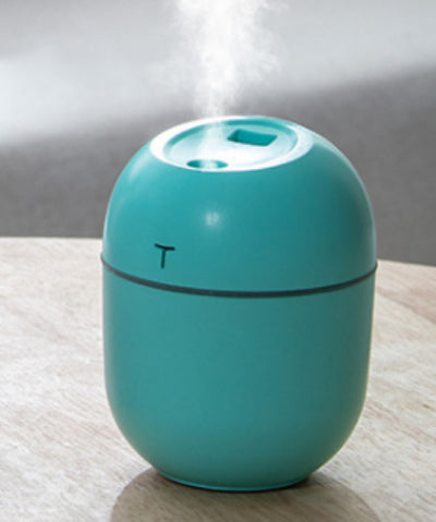 White egg-shaped mini USB humidifier with a 220ml capacity, featuring a subtle 'T' logo and grey accent line. - Image 5