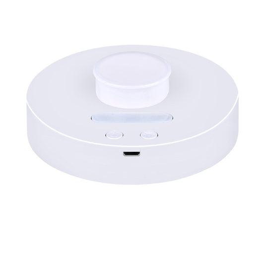 White round portable USB humidifier with a night light, single fog outlet, and two control buttons. - Image 5