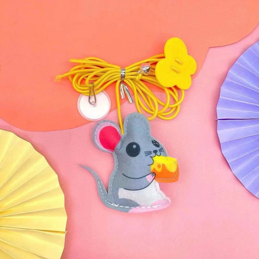 Colorful cat toy with pom-poms, googly eyes, white feathers, and a yellow elastic rope with a suction cup. - Image 8