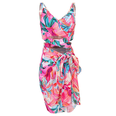 Women's three-piece swimwear set with a cream floral print, ruffled crop top, high-waisted shorts, and matching sarong. - Image 6