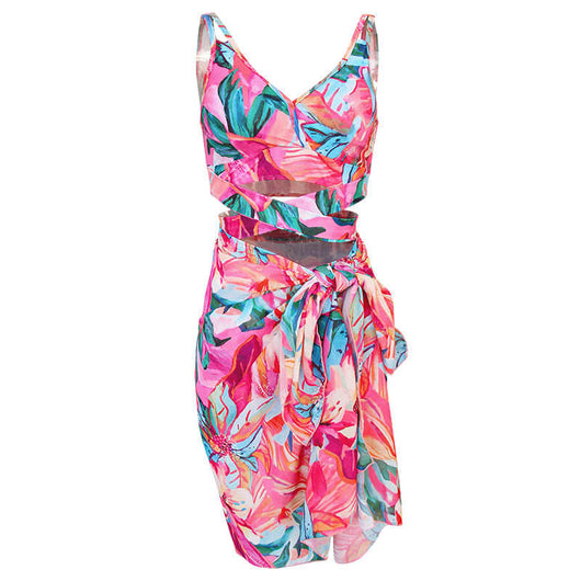 Women's three-piece swimwear set with a cream floral print, ruffled crop top, high-waisted shorts, and matching sarong. - Image 6