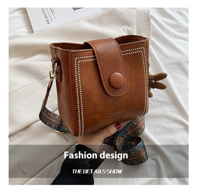 Bolsa Mensajera Retro con Textura Premium - Image 21