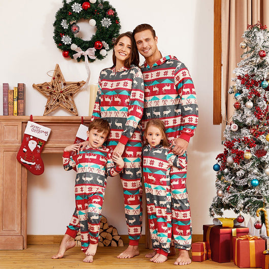 Family of four wearing matching red, teal, and grey Christmas one-piece pajamas with reindeer and snowflake patterns. - Image 3