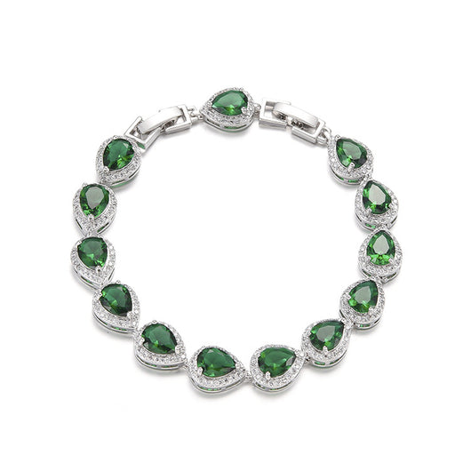 Green pear-shaped gemstone jewelry set with necklace, dangle earrings, ring, and bracelet, all with clear stone accents. - Image 2
