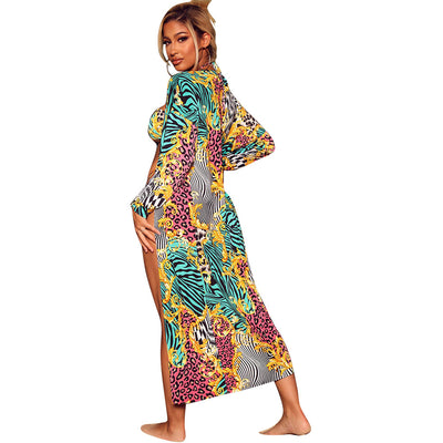 Women's fashion print two-piece swimsuit with a matching long-sleeve cape, featuring vibrant blue, yellow, pink, and black patterns. - Image 6