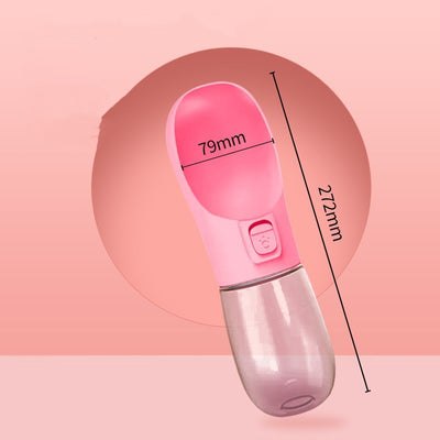 Pink portable pet water bottle with integrated feeder bowl, clear reservoir, and dispensing button for dogs. - Image 7