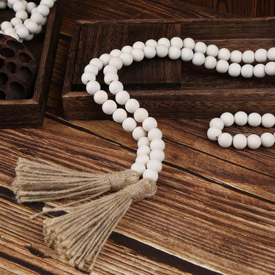Guirnalda rústica de cuentas de madera Farmhouse Beads – 147 cm con borlas, decoración boho country para pared y espacios de oración - Tekeno