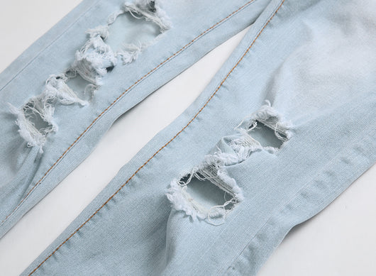 Jeans Slim Fit Azul y Blanco con Diseño de Agujeros Grandes - Importación - Image 2