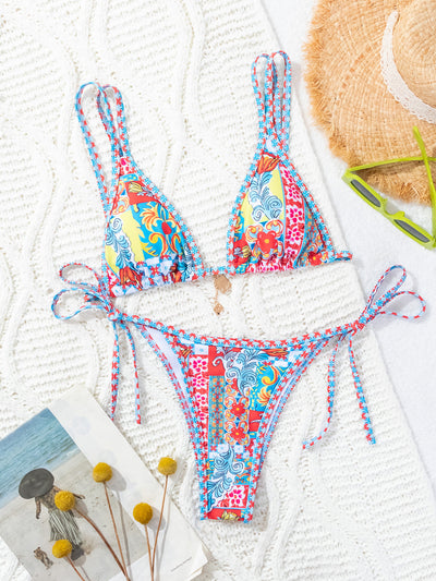 Red floral print triangle cup bikini set with matching bottom, featuring a small gold charm on the top. - Image 41