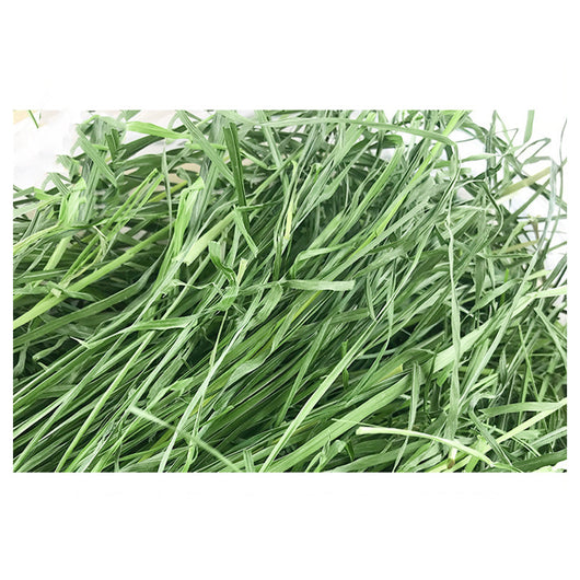 White box of Timothy grass pet food with cartoon rabbits, labeled as green, no pollution, high fiber, nutrition, and health, 1kg. - Image 10