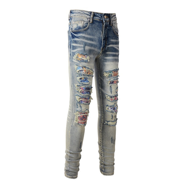 Jeans Azul Bebé Desgastado con Parches Iridiscentes para Hombre