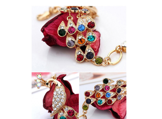 Gold tone peacock bridal jewelry set with colorful crystal accents, including a necklace, bracelet, and dangle earrings. - Image 10