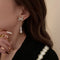 Aretes de Perla con Moño Elegante para Mujer