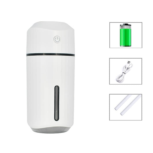 Pink portable humidifier with a power button, water level indicator, USB charging cable, and two cotton swabs. - Image 5