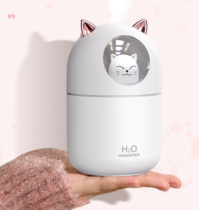Pink portable USB humidifier shaped like a cat, with metallic pink ears and a white cat face inside a clear dome. - Image 4