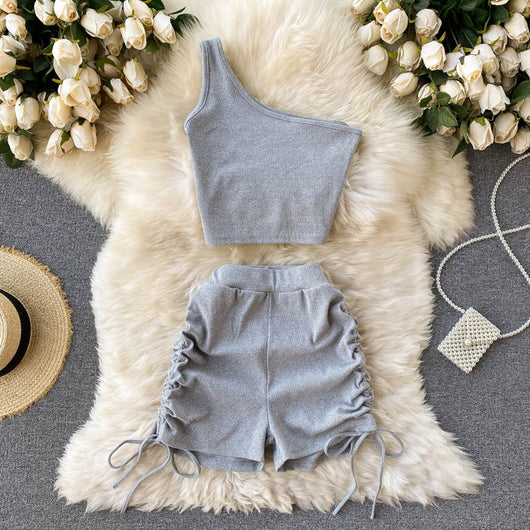 Conjunto Infantil Camiseta Asimétrica con Shorts Talle Alto Plisados - Image 4