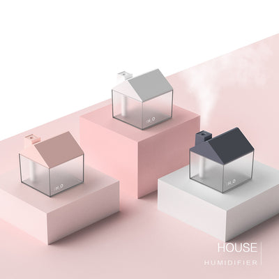 Two house-shaped USB humidifiers, one dark gray and one pink, with clear bases showing H₂O text. - Image 7