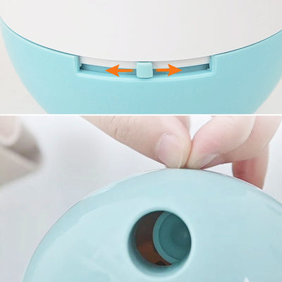 Orange and blue interactive pet food dispenser toy with multiple tiers and white balls, next to its black packaging. - Image 4