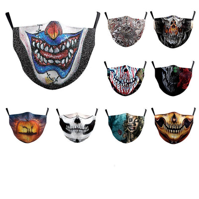 Dark green dust mask with a pattern of white skulls, blue flowers, and pink butterflies, featuring black ear loops.