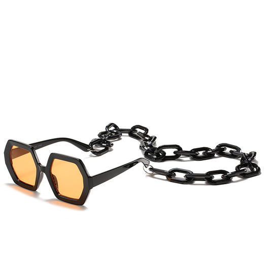 Octagonal sunglasses with brown gradient lenses and a tortoiseshell chain strap on a white background. - Image 5