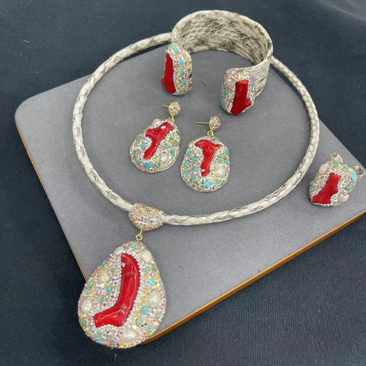 Four-piece jewelry set with white snakeskin leather, red coral-like inlays, pearls, and gemstones. - Image 10
