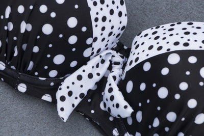 Retro black and white polka dot bikini with a tie-front top and high-waisted bottom. - Image 8