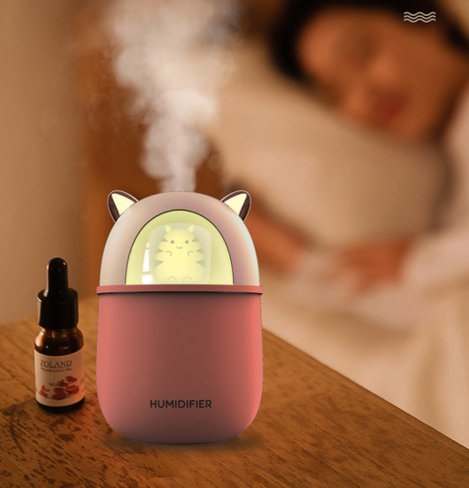Pink portable USB humidifier shaped like a cat, with metallic pink ears and a white cat face inside a clear dome. - Image 10