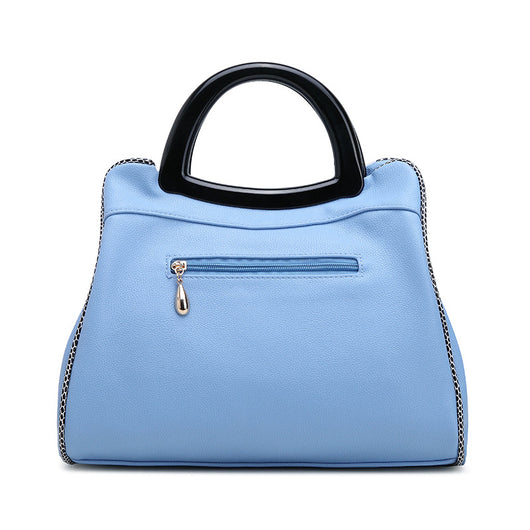 Bolsa de Cuero para Mujer Diseñador con Flores Grabadas - Estilo Retro Elegante - Image 2