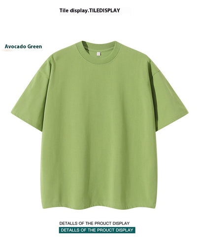 Moss green short-sleeve cotton t-shirt with a crew neck and a relaxed, oversized fit. - Image 28