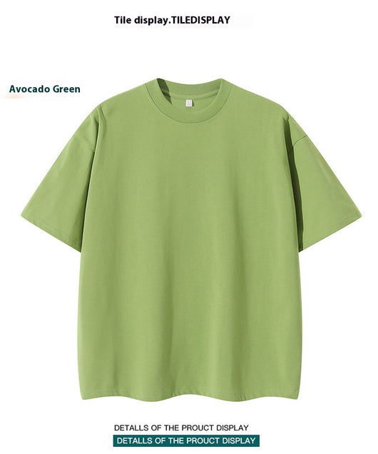 Moss green short-sleeve cotton t-shirt with a crew neck and a relaxed, oversized fit. - Image 28