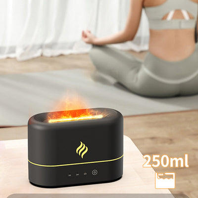 White simulated flame humidifier with blue light effect and yellow flame icon, sitting on a white table. - Image 7