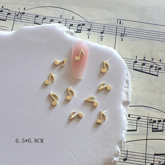 Accesorios de Uñas Metálicos con Símbolos Musicales - Image 14