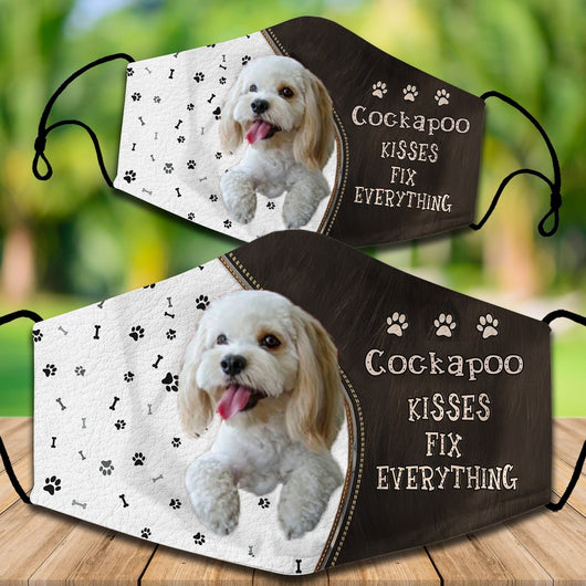 Two cotton face masks with a Bichon Frise dog, paw prints, and bones on a white and brown background. Text reads "Bichon Frise KISSES FIX EVERYTHING." - Image 27