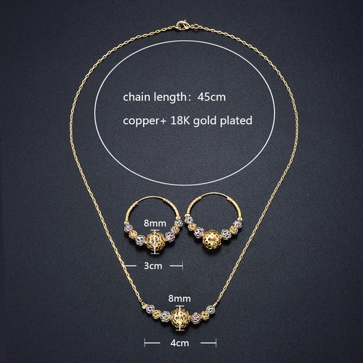 Multicolor cutout round beads necklace and matching hoop earrings set with gold, silver, and purple beads. - Image 2