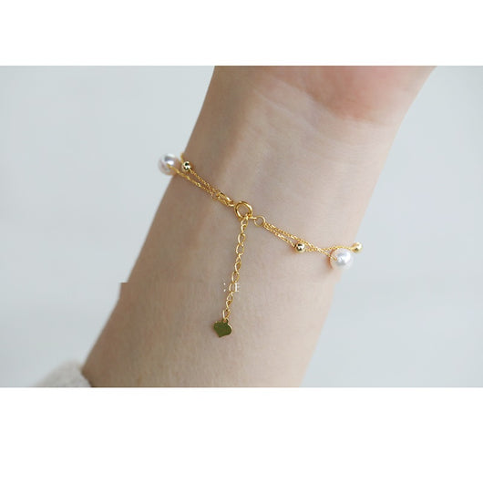 Pulsera Doble Ajustable de Perlas de Agua de Mar en Oro 18k - Image 7