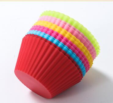 Six colorful silicone cupcake liners in red, blue, hot pink, yellow, pink, and lime green on a white background. - Image 9