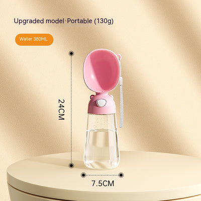 Yellow portable pet water bottle with clear reservoir, built-in drinking bowl, and wrist strap, 28cm tall. - Image 9