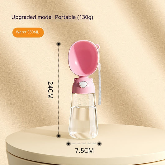 Yellow portable pet water bottle with clear reservoir, built-in drinking bowl, and wrist strap, 28cm tall. - Image 9